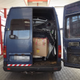 Image for article titled Here's Proof You Can Fit An Entire BMW X6 Into A Van